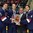 GRAND FORKS, NORTH DAKOTA - APRIL 24: IIHF Tournament Chairman Frank Gonzalez presents the third place trophy to USA's Ryan Lindgren #18, Chad Krys #4 and Luke Martin #2 following a 10-3 bronze medal game win over Canada at the 2016 IIHF Ice Hockey U18 World Championship. (Photo by Minas Panagiotakis/HHOF-IIHF Images)

